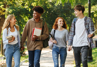 Group of college students walking together